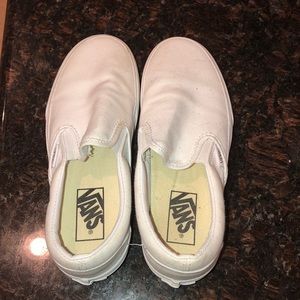 White platform slip on vans